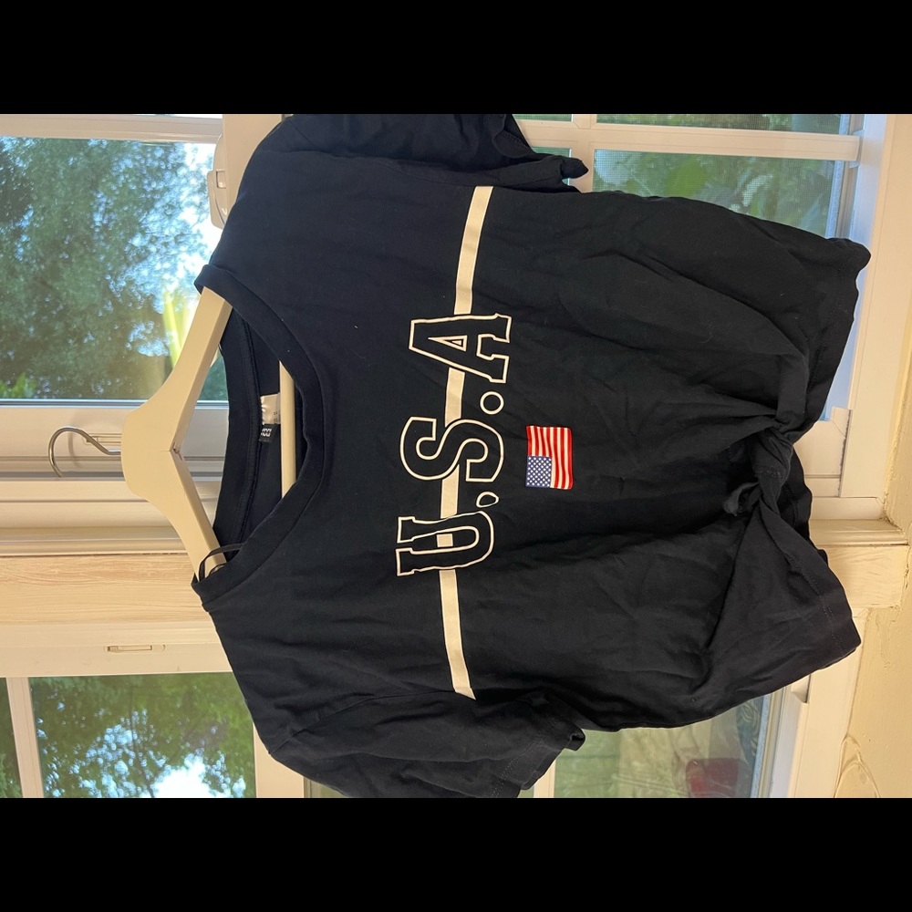 Blue crop top with a knot.